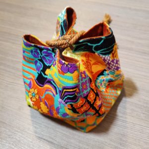 Orange floral drawstring bag